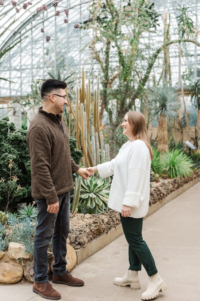 A couple looking at each other longingly during their engagement session in Chicago